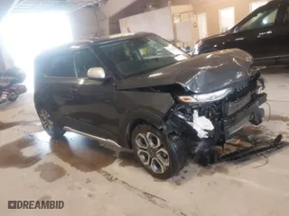 2021 Kia Soul LX with VIN KNDJ23AU5M7770063, listed as a IAAI auction lot 41554244 with 55,365 mi miles. Bid and sale history available at carsss.com. Image 1.