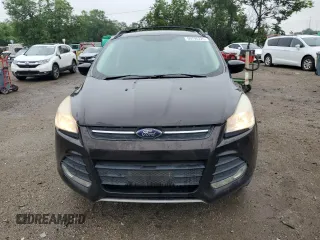 2013 Ford Escape SE z VIN 1FMCU0GX2DUB10398, wystawiony jako Copart lot #59795225 z przebiegiem 174 344 mil mil oraz Czysty tytuł • Clean title. Historia ofert i sprzedaży dostępna na DreamBid. Obrazek 5.