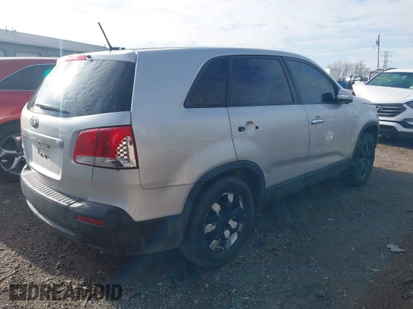2013 Kia Sorento LX with VIN 5XYKTCA61DG405806, listed as a IAAI auction lot 41966976 with 129,942 mi miles and . Bid and sale history available at DreamBid. Image 4.