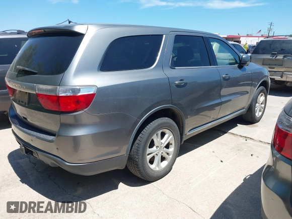 2013 Dodge Durango SXT z VIN 1C4RDHAG4DC512046, wystawiony jako IAAI lot #42826019 z przebiegiem 192 308 mil mil oraz . Historia ofert i sprzedaży dostępna na DreamBid. Obrazek 4.