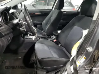 2015 Mitsubishi Lancer GT with VIN JA32U8FW4FU022218, listed as a Copart auction lot 84468334 with 76,297 mi miles and Salvage Title. Bid and sale history available at carsss.com. Image 7.