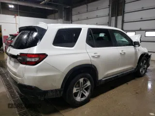 2025 Honda Pilot EX-L z VIN 5FNYG1H40SB041549, wystawiony jako Copart lot #89219285 z przebiegiem 6 915 mil mil oraz Nie do naprawy • Non repairable. Historia ofert i sprzedaży dostępna na DreamBid. Obrazek 3.