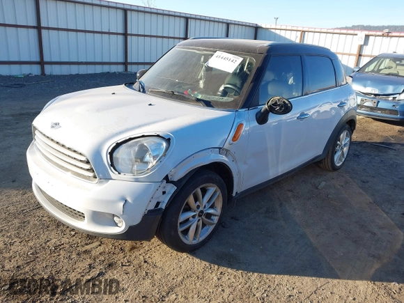 2012 MINI Countryman with VIN WMWZB3C55CWM03612, listed as a IAAI auction lot 41445142 with 217,495 mi miles and . Bid and sale history available at DreamBid. Image 2.