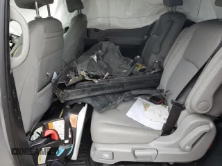 2019 Honda Odyssey EX-L z VIN 5FNRL6H7XKB049729, wystawiony jako Copart lot #55953075 z przebiegiem 129 194 mil mil oraz Szkoda całkowita • Salvage title. Historia ofert i sprzedaży dostępna na DreamBid. Obrazek 11.