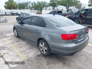 2013 Volkswagen Jetta TDI w/Premium with VIN 3VWLL7AJ4DM351806, listed as a IAAI auction lot 42654515 with 146,910 mi miles and . Bid and sale history available at DreamBid. Image 3.
