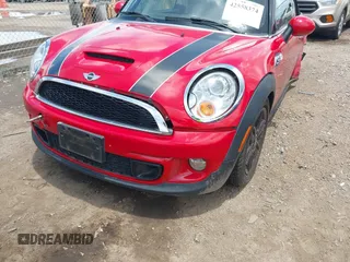 2013 MINI Convertible S z VIN WMWZP3C50DT297624, wystawiony jako IAAI lot #42558374 z przebiegiem 55 106 mil mil oraz . Historia ofert i sprzedaży dostępna na DreamBid. Obrazek 6.