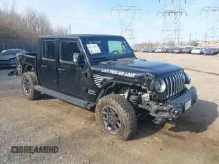 2021 Jeep Gladiator Overland z VIN 1C6HJTFG1ML606215, wystawiony jako IAAI lot #41771646 z przebiegiem 77 411 mil mil oraz . Historia ofert i sprzedaży dostępna na DreamBid. Obrazek 6.