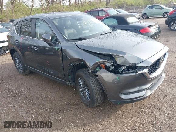 2020 Mazda CX-5 Touring with VIN JM3KFBCM8L0863951, listed as a IAAI auction lot 41921635 with 88,629 mi miles. Bid and sale history available at carsss.com. Image 1.