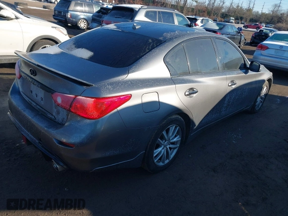 2015 Infiniti Q50 Premium z VIN JN1BV7AR2FM423666, wystawiony jako IAAI lot #41345228 z przebiegiem 67 027 mil mil oraz . Historia ofert i sprzedaży dostępna na DreamBid. Obrazek 4.