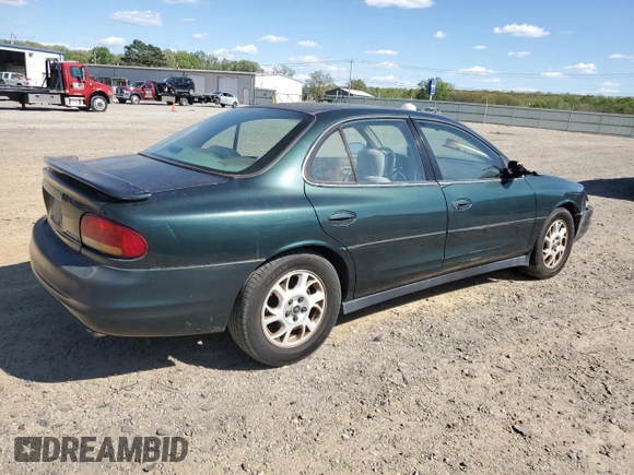 2000 Oldsmobile Intrigue GX z VIN 1G3WH52H3YF336012, wystawiony jako Copart lot #53078445 z przebiegiem 119 039 mil mil oraz Szkody całkowita. Historia ofert i sprzedaży dostępna na DreamBid. Obrazek 3.