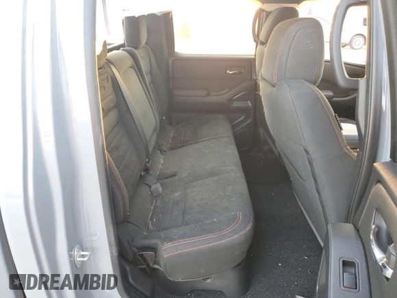 2024 Nissan Frontier Pro-X z VIN 1N6ED1EJ7RN619600, wystawiony jako Copart lot #74284664 z przebiegiem 19 786 mil mil oraz Szkoda całkowita • Salvage title. Historia ofert i sprzedaży dostępna na DreamBid. Obrazek 10.