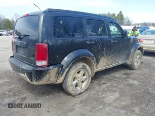 2008 Dodge Nitro SXT with VIN 1D8GU28K98W225158, listed as a IAAI auction lot 41911789 with 180,450 mi miles. Bid and sale history available at carsss.com. Image 4.