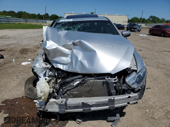 2015 Ford Taurus SEL z VIN 1FAHP2E85FG203397, wystawiony jako Copart lot #51821405 z przebiegiem 78 592 mil mil oraz Szkody całkowita. Historia ofert i sprzedaży dostępna na DreamBid. Obrazek 5.