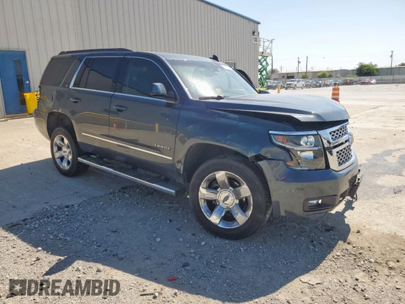 2019 Chevrolet Tahoe LT with VIN 1GNSCBKC0KR273948, listed as a Copart auction lot 61309785 with 155,428 mi miles and Salvage title. Bid and sale history available at DreamBid. Image 4.