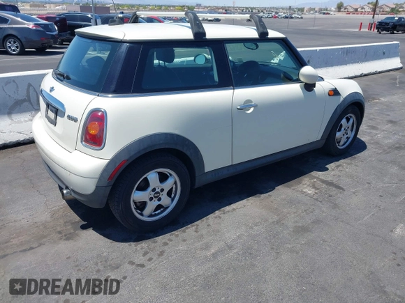 2010 MINI Hardtop with VIN WMWMF3C53ATZ25765, listed as a IAAI auction lot 42314587 with 107,677 mi miles and . Bid and sale history available at DreamBid. Image 4.