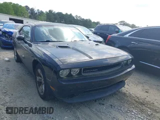 2012 Dodge Challenger SXT Plus with VIN 2C3CDYAG3CH171504, listed as a IAAI auction lot 42093327 with 102,574 mi miles. Bid and sale history available at carsss.com. Image 1.