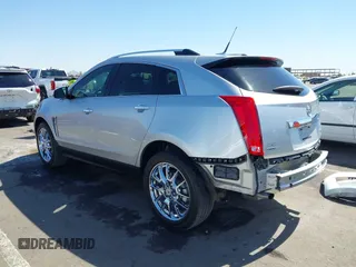 2013 Cadillac SRX Premium Collection z VIN 3GYFNEE36DS556446, wystawiony jako IAAI lot #42289824 z przebiegiem 23 988 mil mil oraz . Historia ofert i sprzedaży dostępna na DreamBid. Obrazek 3.