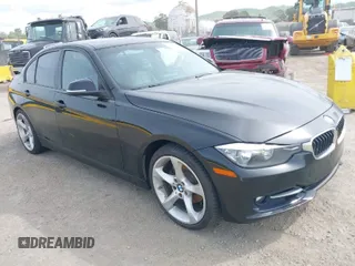 2012 BMW 3 Series 328i with VIN WBA3A5C56CF345904, listed as a IAAI auction lot 41992572 with 136,672 mi miles. Bid and sale history available at carsss.com. Image 1.