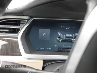 2013 Tesla Model S with VIN 5YJSA1CN8DFP21869, listed as a IAAI auction lot 41772603 with Not provided miles and . Bid and sale history available at DreamBid. Image 16.