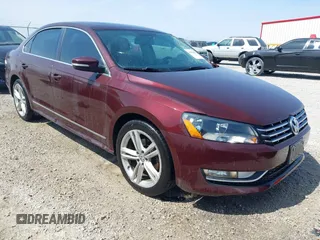 2013 Volkswagen Passat SEL Premium z VIN 1VWCN7A37DC090698, wystawiony jako IAAI lot #41929487 z przebiegiem 191 934 mil mil oraz . Historia ofert i sprzedaży dostępna na DreamBid. Obrazek 1.