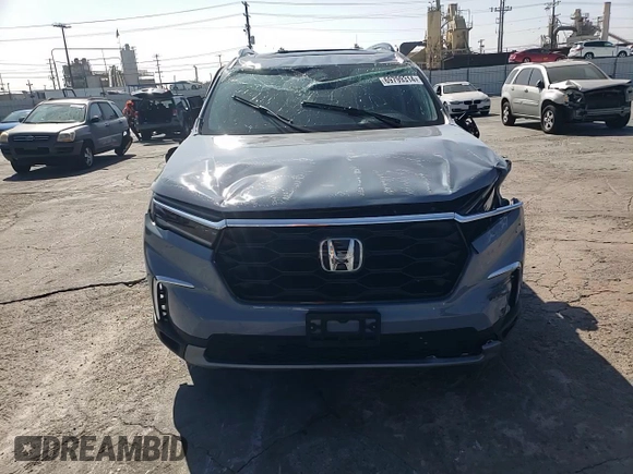 2023 Honda Pilot Touring with VIN 5FNYG2H7XPB011420, listed as a Copart auction lot 69799314 with 9,601 mi miles and Salvage Title. Bid and sale history available at DreamBid. Image 12.
