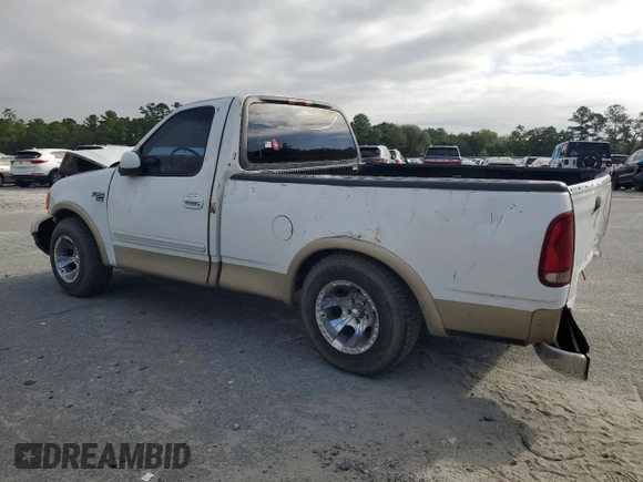 1999 Ford F-150 XL with VIN 1FTRF17L8XNA75702, listed as a Copart auction lot 69868104 with Not provided miles and Salvage title. Bid and sale history available at DreamBid. Image 2.