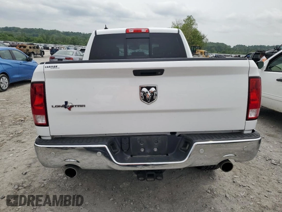 2018 Ram 1500 Lone Star Silver with VIN 1C6RR6LT6JS266013, listed as a Copart auction lot 56895915 with 136,453 mi miles and Salvage title. Bid and sale history available at DreamBid. Image 6.