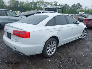 2014 Audi A6 Premium Plus z VIN WAUFGAFC4EN081900, wystawiony jako IAAI lot #42268150 z przebiegiem 150 238 mil mil oraz . Historia ofert i sprzedaży dostępna na DreamBid. Obrazek 4.