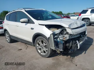 2016 Ford Escape Titanium with VIN 1FMCU9J9XGUA89514, listed as a IAAI auction lot 42387871 with 65,085 mi miles and . Bid and sale history available at DreamBid. Image 1.