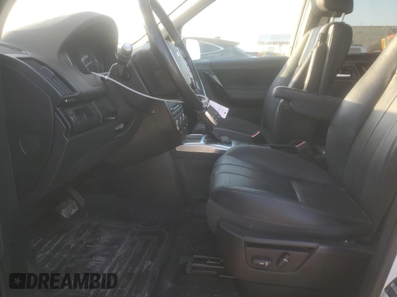 2015 Land Rover LR2 с VIN SALFP2BG2FH425427, выставлен на аукционе Copart как лот 77018534 с пробегом 132 602 миль миль и Списание • Salvage title. История ставок и продаж доступна на DreamBid. Изображение 7.