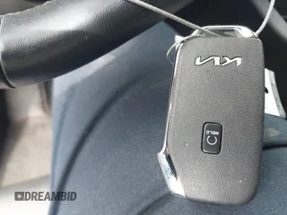 2022 Kia K5 GT-Line z VIN 5XXG64J23NG156401, wystawiony jako IAAI lot #42051123 z przebiegiem 71 853 mil mil oraz . Historia ofert i sprzedaży dostępna na DreamBid. Obrazek 11.