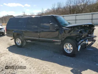 1999 GMC Suburban z VIN 3GKGK26J2XG514835, wystawiony jako Copart lot #47853685 z przebiegiem 124 657 mil mil oraz Tytuł czysty. Historia ofert i sprzedaży dostępna na DreamBid. Obrazek 4.