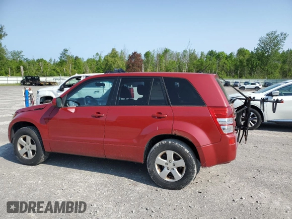 2012 Suzuki Grand Vitara Premium z VIN JS3TD0D60C4100503, wystawiony jako Copart lot #59050575 z przebiegiem 158 052 mil mil oraz Tytuł czysty. Historia ofert i sprzedaży dostępna na DreamBid. Obrazek 2.