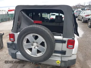 2008 Jeep Wrangler Unlimited Sahara with VIN 1J4GA59158L501099, listed as a IAAI auction lot 41743590 with 213,941 mi miles and . Bid and sale history available at DreamBid. Image 16.