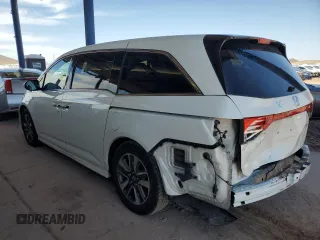 2014 Honda Odyssey Touring с VIN 5FNRL5H94EB110797, выставлен на аукционе Copart как лот 60702365 с пробегом 106 131 миль миль и Списание • Salvage title. История ставок и продаж доступна на DreamBid. Изображение 2.