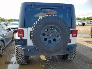 2017 Jeep Wrangler Unlimited Sahara with VIN 1C4HJWEG0HL585262, listed as a Copart auction lot 58748155 with 133,267 mi miles and Salvage title. Bid and sale history available at DreamBid. Image 6.