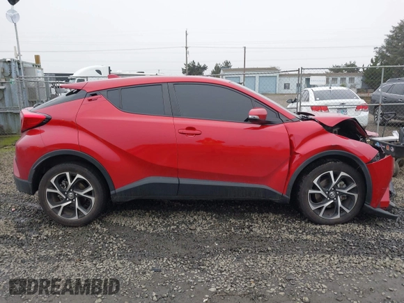 2021 Toyota C-HR LE with VIN JTNKHMBX1M1104530, listed as a IAAI auction lot 41324350 with 53,112 mi miles. Bid and sale history available at carsss.com. Image 13.
