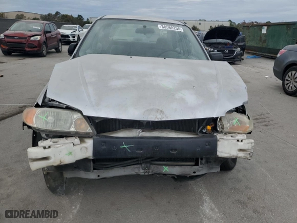 2001 Mazda Protege DX with VIN JM1BJ222310425181, listed as a Copart auction lot 88560255 with 201,942 mi miles and Salvage Title. Bid and sale history available at carsss.com. Image 5.