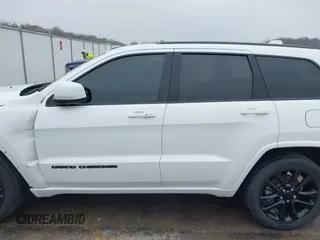 2021 Jeep Grand Cherokee Laredo E with VIN 1C4RJEAG7MC713026, listed as a IAAI auction lot 42010894 with 37,336 mi miles and . Bid and sale history available at DreamBid. Image 15.