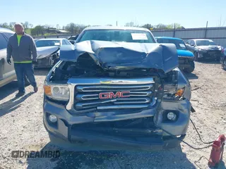 2019 GMC Canyon 4WD SLE with VIN 1GTG6CEN2K1102111, listed as a IAAI auction lot 41938971 with 156,260 mi miles and . Bid and sale history available at carsss.com. Image 6.