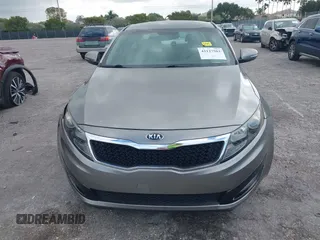 2013 Kia Optima LX z VIN 5XXGM4A74DG147688, wystawiony jako IAAI lot #42127503 z przebiegiem 148 705 mil mil oraz . Historia ofert i sprzedaży dostępna na DreamBid. Obrazek 12.