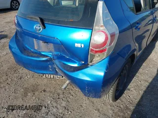 2012 Toyota Prius c One with VIN JTDKDTB34C1026833, listed as a IAAI auction lot 42001552 with 224,426 mi miles. Bid and sale history available at carsss.com. Image 6.