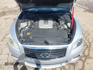 2013 Infiniti M with VIN JN1BY1AP0DM513527, listed as a IAAI auction lot 42170513 with 194,908 mi miles and . Bid and sale history available at DreamBid. Image 10.