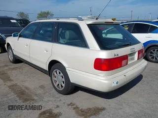 1996 Audi A6 z VIN WAUJA84A1TN104505, wystawiony jako IAAI lot #42039674 z przebiegiem 171 088 mil mil oraz . Historia ofert i sprzedaży dostępna na DreamBid. Obrazek 3.