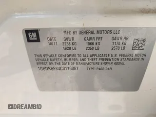 2012 Cadillac CTS Performance z VIN 1G6DK5E34C0116367, wystawiony jako IAAI lot #42373255 z przebiegiem 93 444 mil mil oraz . Historia ofert i sprzedaży dostępna na DreamBid. Obrazek 9.