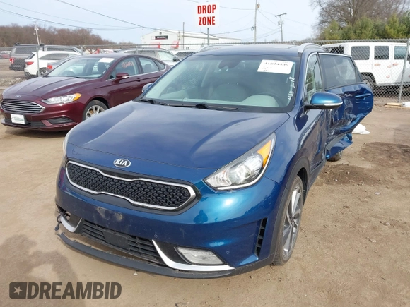 2018 Kia Niro Touring with VIN KNDCE3LC6J5174472, listed as a IAAI auction lot 41824400 with 83,182 mi miles. Bid and sale history available at carsss.com. Image 2.