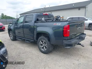 2019 Chevrolet Colorado 4WD Z71 with VIN 1GCGTDEN5K1328061, listed as a IAAI auction lot 42505934 with 76,520 mi miles and . Bid and sale history available at DreamBid. Image 3.