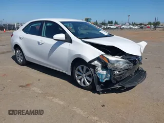 2015 Toyota Corolla L z VIN 2T1BURHE1FC434878, wystawiony jako IAAI lot #42354185 z przebiegiem 106 884 mil mil oraz . Historia ofert i sprzedaży dostępna na DreamBid. Obrazek 1.