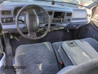 1999 Ford F-250 XL with VIN 1FTNX21FXXEC98957, listed as a Copart auction lot 61476665 with 414,070 mi miles and Salvage title. Bid and sale history available at DreamBid. Image 8.