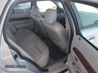 2003 Mercury Grand Marquis LS Premium z VIN 2MEFM75W83X631023, wystawiony jako IAAI lot #42227245 z przebiegiem 114 235 mil mil oraz . Historia ofert i sprzedaży dostępna na DreamBid. Obrazek 8.